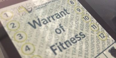 New Zealand Warrant of Fitness (WOF) sticker.