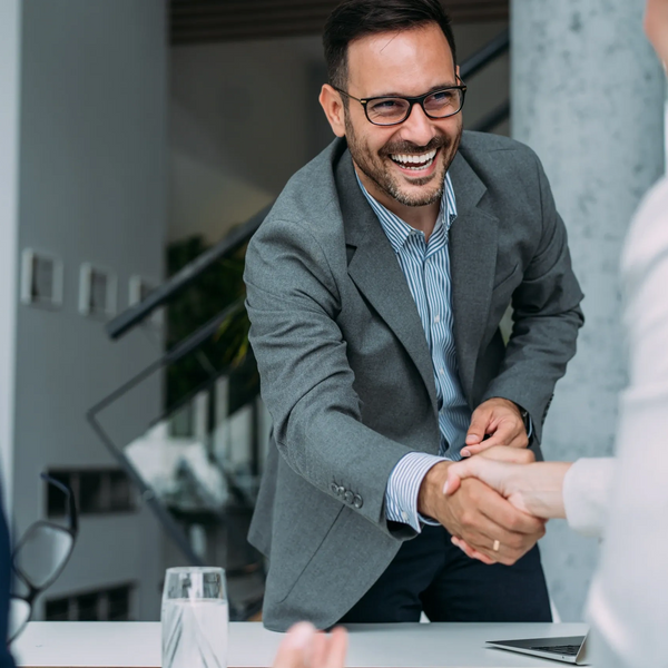 Business handshake showing pharma partnership intent