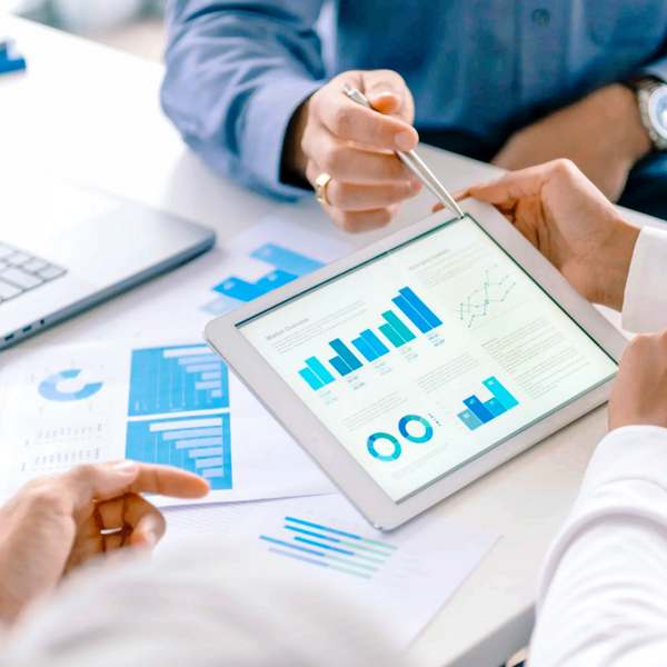Team analyzing pharma data for strategy
