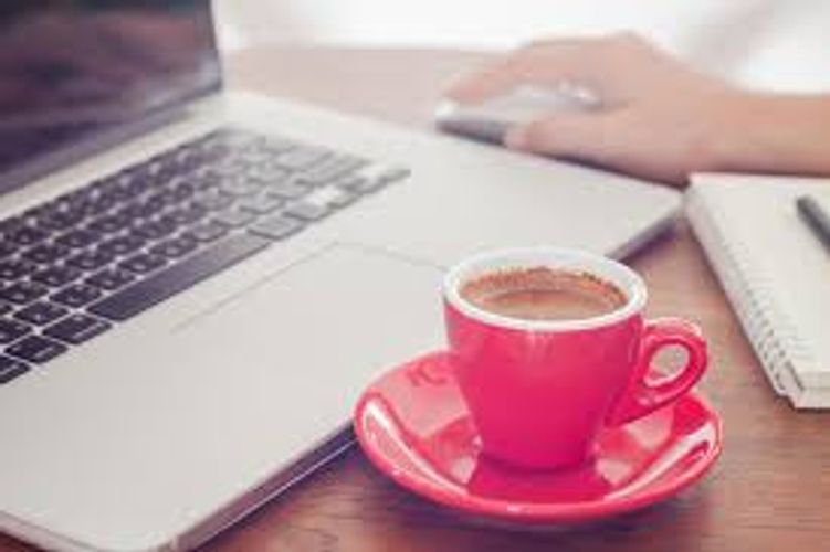 Productivity must-haves: laptop & coffee