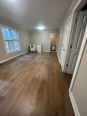 Install 600 sq ft LVP flooring with underlayment. Required carpet removal and extensive floor prep