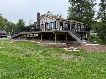 Full deck tear down, rebuild, two toned composite decking with aluminum rails.