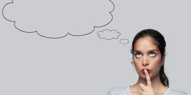 woman thinking with a cartoon thought bubble