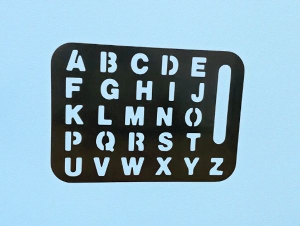 Stencil with uppercase alphabet letters from A to Z.