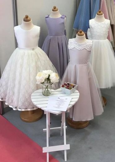 Holy Communion & flowergirl dresses on display at a show