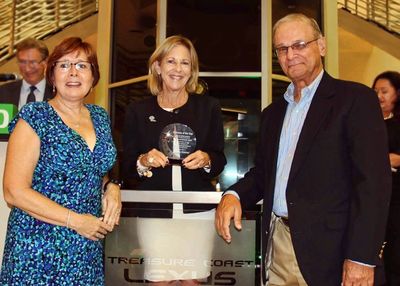 Julie and Bob receiving the award for the Best Non-Profit Business from the Chamber of Commerce