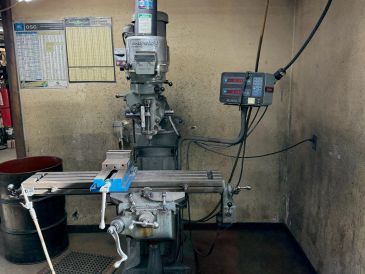 Industrial milling machine in a workshop.