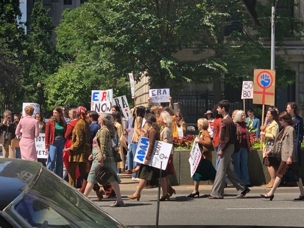 Mrs. America - protest in the street
