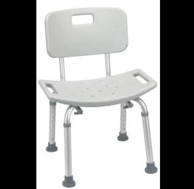 White plastic shower chair with handles and backrest.