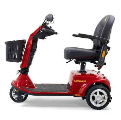 Red mobility scooter with black seat and front basket.