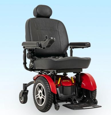 Black and red motorized wheelchair with cushioned seat and armrests.