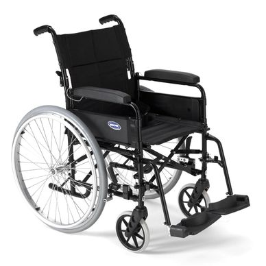 Black manual wheelchair with large rear wheels and footrests.