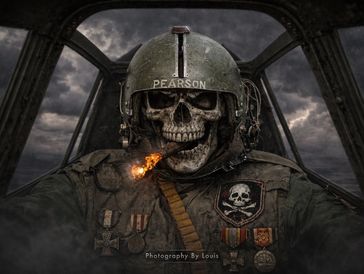 Soldier with a skull face inside a military vehicle.