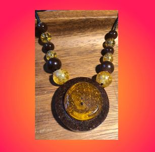 Acacia Sun Disc Necklace. Can be worn by men or women. Most people can feel the energy immediately.
