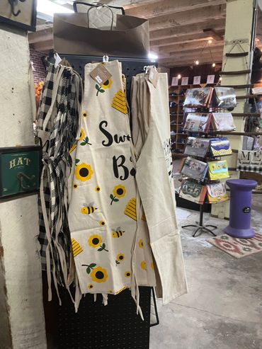 Kitchen aprons in bold colors.