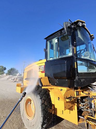 On-site heavy equipment washing of a CAT loader in Colorado