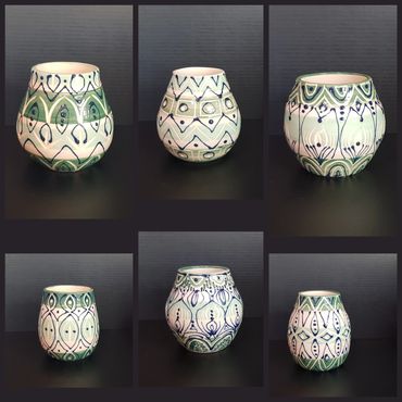 Slip trailing in dark blue on containers