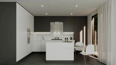 Modern kitchen with black and white cabinetry and an island.