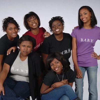 Where it began: Members of Building A Better You’s first group of girls in the early 2000s. More tha