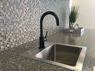 kitchen fixtures, countertops, cabinets, and backsplash remodel and installation