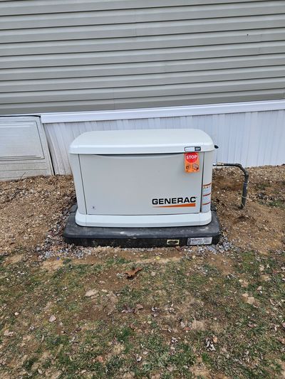 Generac 26kW Whole-House Generator on a new 4" gravel base and pad