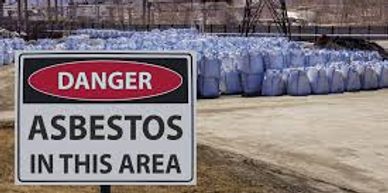 Sign that says, "Danger, Asbestos in this area".