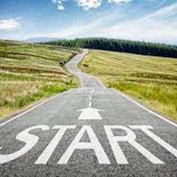 A country road that has the words "Start" written on it.
