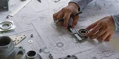 Engineering blueprints with engineering tools.