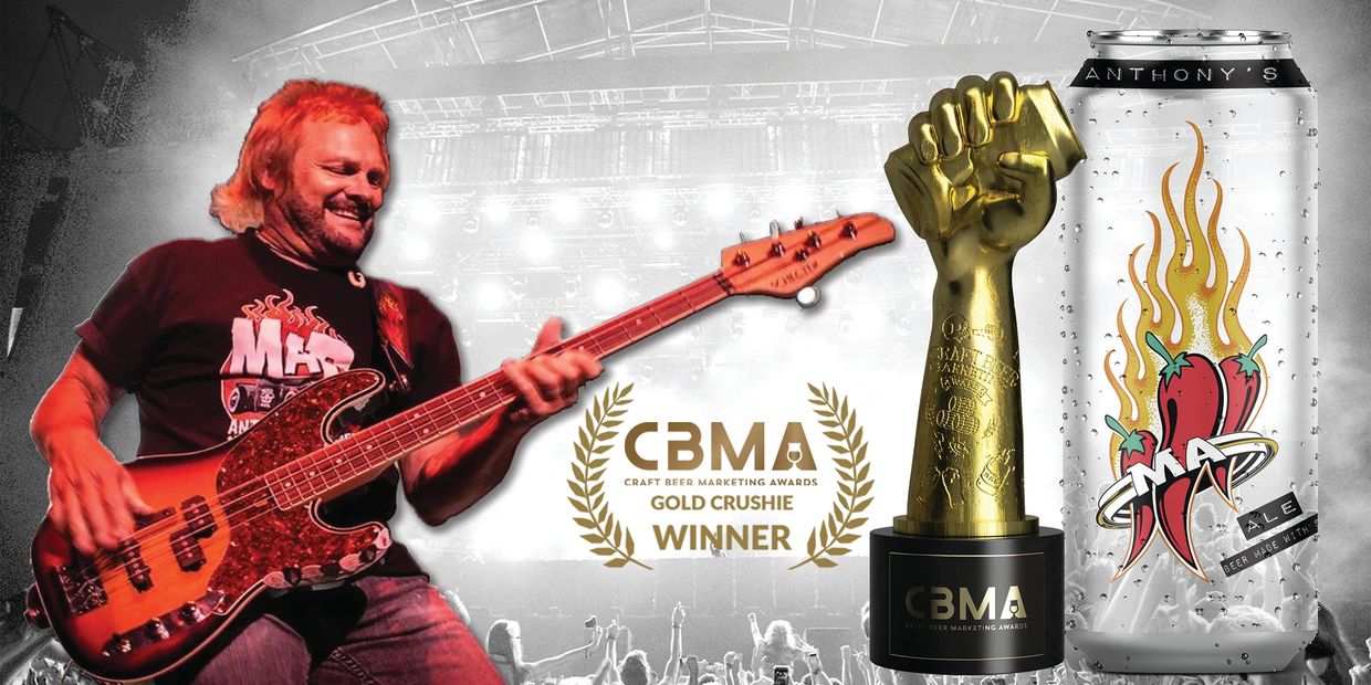 Michael Anthony playing guitar, Crushie award and beer can.