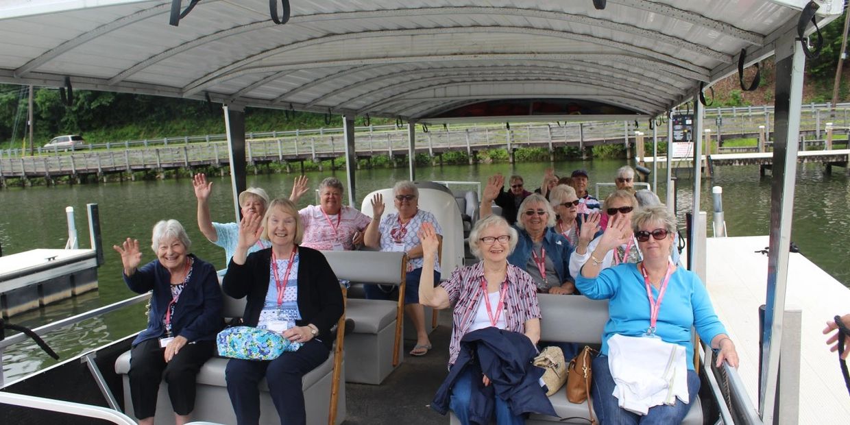 Senior citizens on a boat ride.
