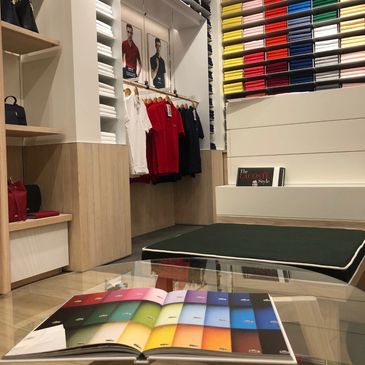Clothing store interior with color swatch book.