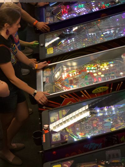 Top View of people having fun of Playing at Seattle Pinball Museum