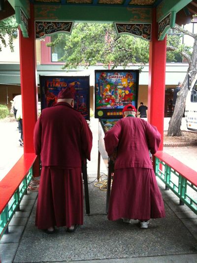 Monks Playing pinball from Seattle pinball museum in Hing Hay Park