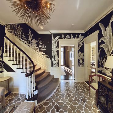 MJ Atelier wallpaper in a foyer/staircase, enhancing the space with intricate detail.