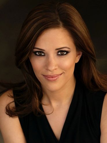 Woman actress smiling.