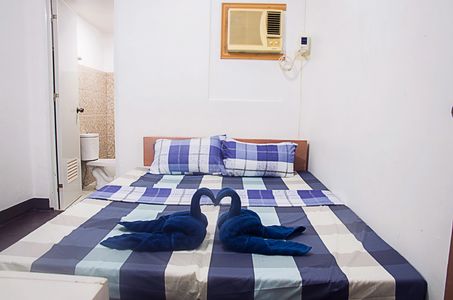 One double/twin size bed,Private toilet and bath
