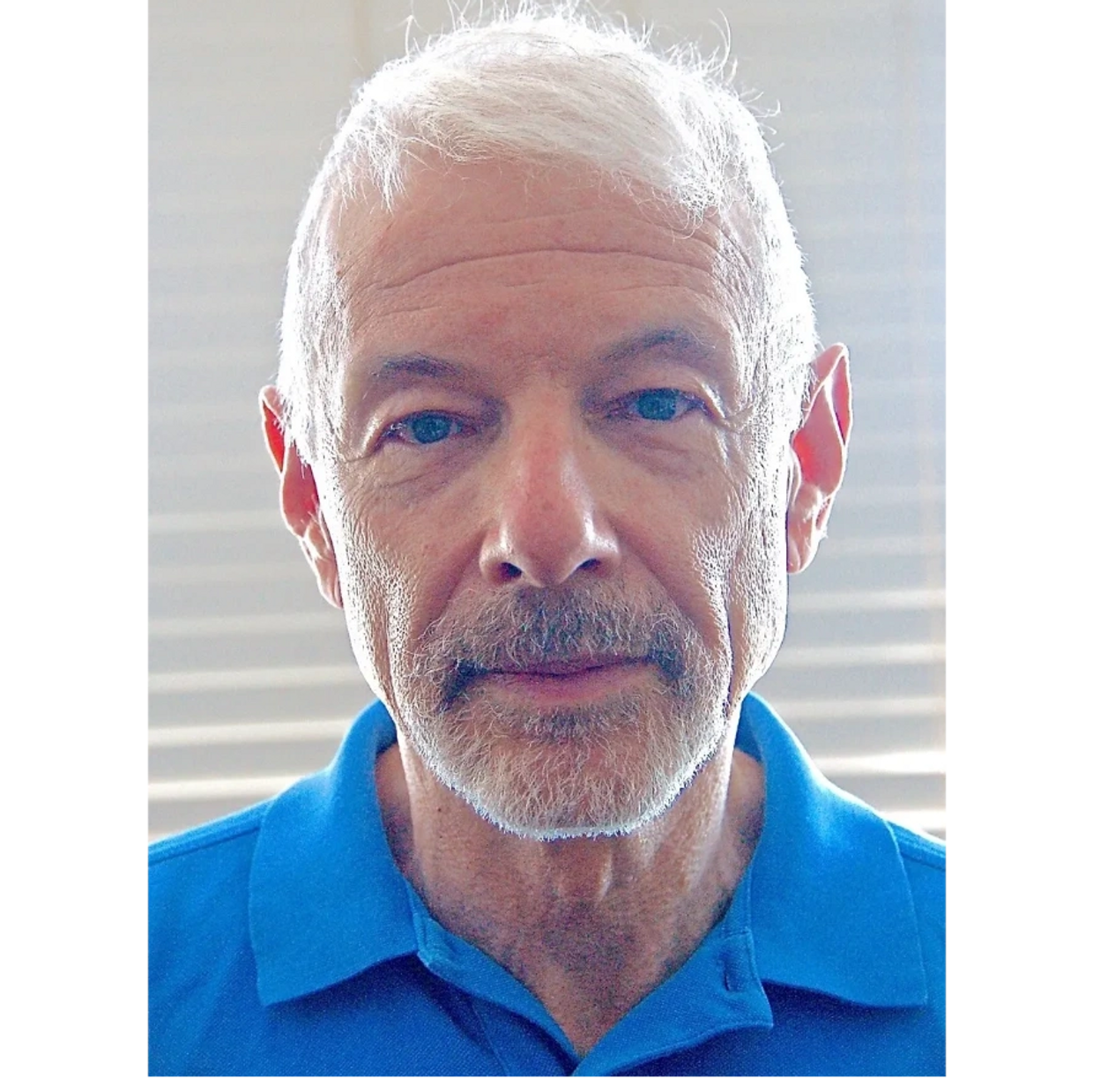 Close face photo of author Perry Brass.