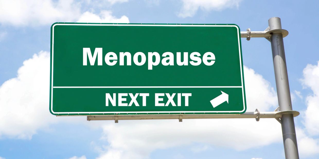 Sign showing an exit to Menopause for Menopause hot flashes hypnosis treatment