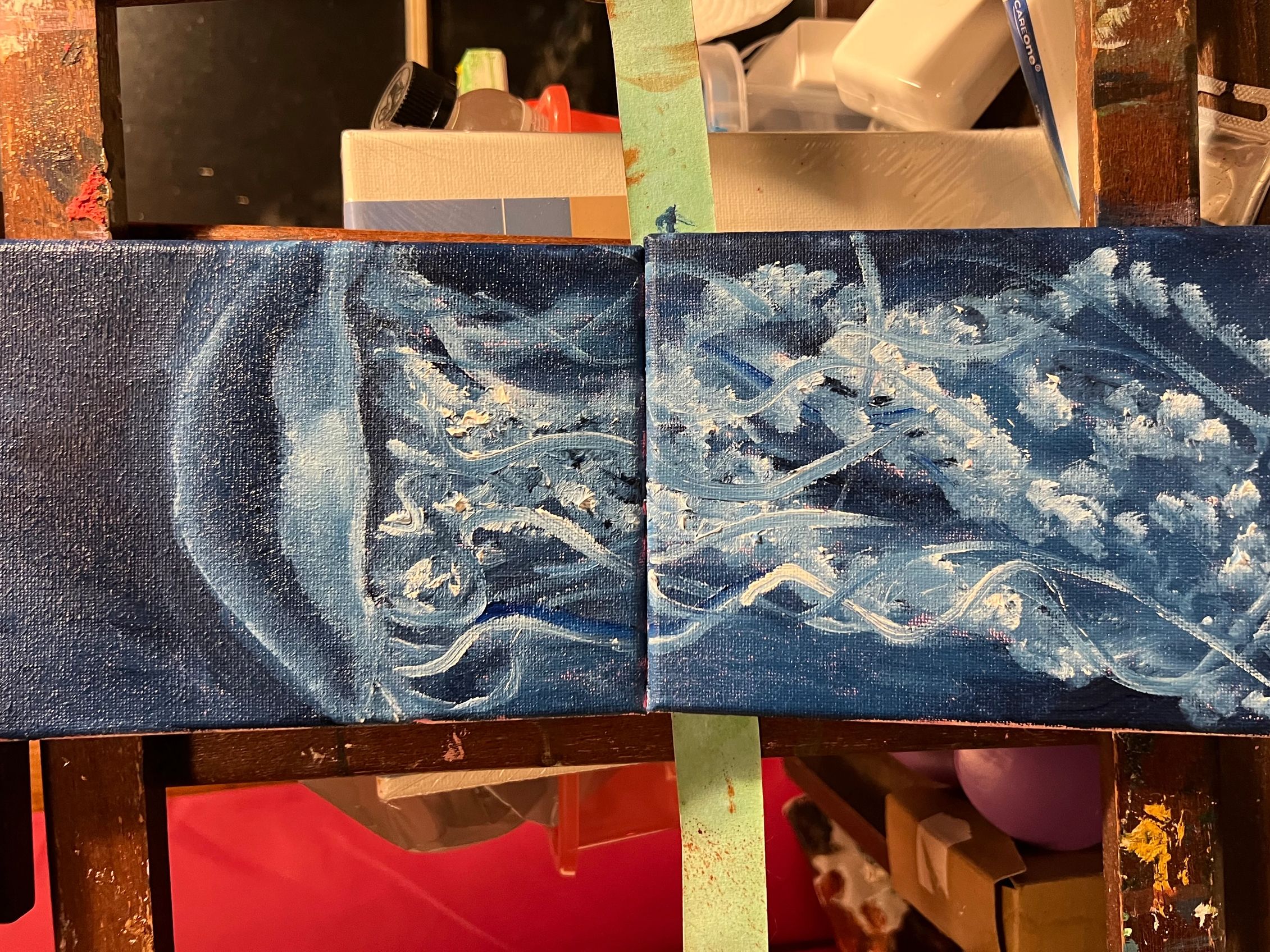 A blue painting of a jellyfish on canvas.