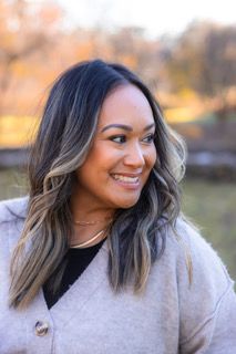 Nicole Hild with castle and crown travel boutique. Disney vacation planner, Disney travel agent