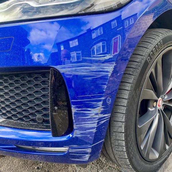 jaguar bumper scuff repair car damage blue paint