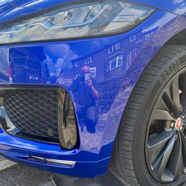 jaguar repaired bumper scuff blue paint gloss shiny