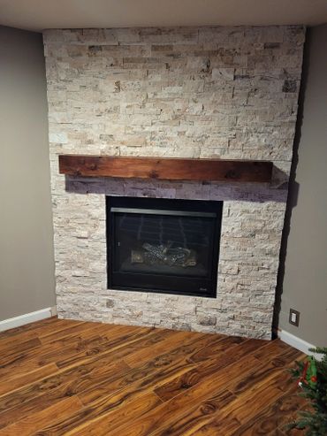 Distressed mantel with complimenting floors. 