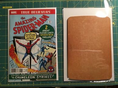 Marvel's The Amazing Spider-Man comic issue 1 with a protective sleeve and backing.