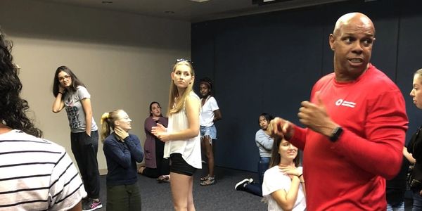 Group of people along with trainer taking training session