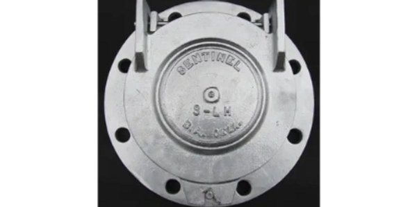 Metal mechanical component with engraved text and mounting holes.