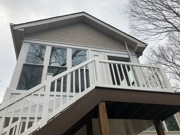 Sunroom with deck stairs attached