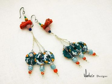 E760
Stones: Aquamarine, Agate, African Beads, Lapis Lazuli, Coral, Mooakite & Turquoise.
Price: Egp