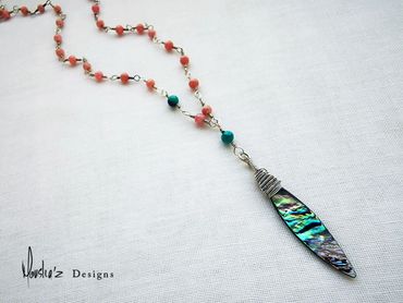 N768
Stones: Rhodochrosite, Turquoise & Abalone Shell.
Price: Egp 2400