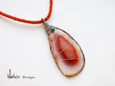 P575
Stones: Agate slice & Turquoise in Genuine Suede Leather Necklace.
Price: Egp 1600